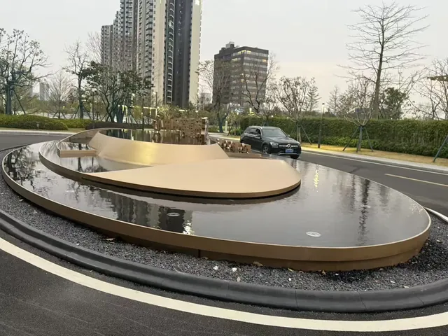 Completed outdoor stainless steel water feature and metalwork